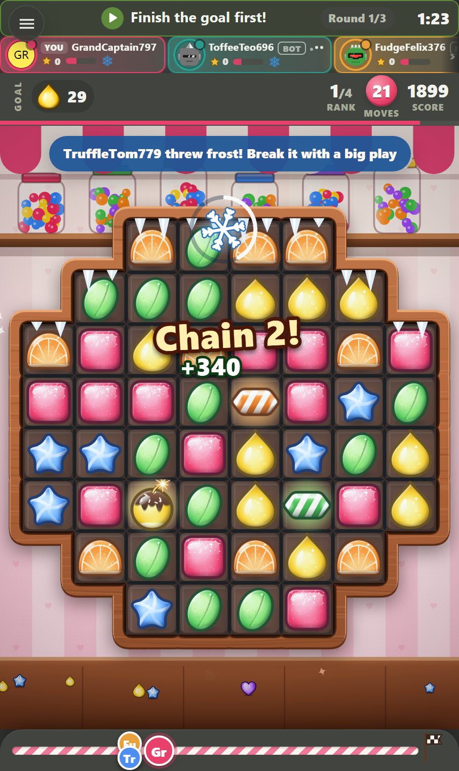 Frost incoming on a Sugar Duel board: a snowflake hangs over the tray while a chain breaks below